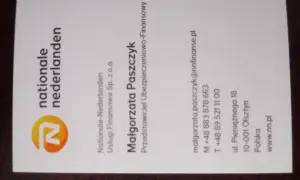 Wizytówka z logo Nationale-Nederlanden i danymi kontaktowymi Małgorzaty Paszczyk.