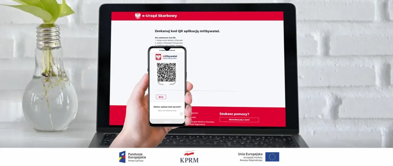 Jak rozliczyć PIT przez mObywatel? Zeskanuj kod QR aplikacją mObywatel na ekranie laptopa. Proste i szybkie rozliczenie podatku.