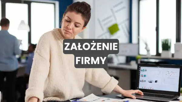Kobieta analizuje wykresy na laptopie, przygotowując się do założenia firmy. JDG co to? To prosty sposób na rozpoczęcie własnej działalności.